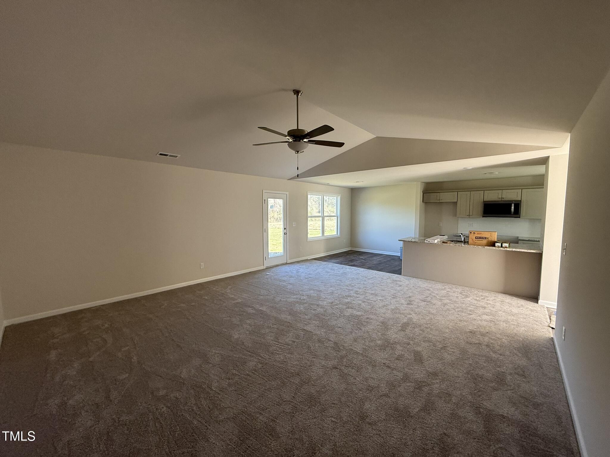 148 Phil Jack Road Dunn, NC 28334 - Photo 5 of 18 a living room with furniture and a window