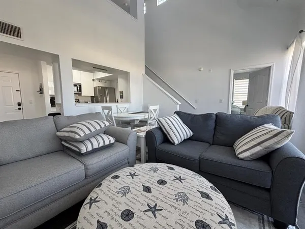 a living room with furniture and a couch