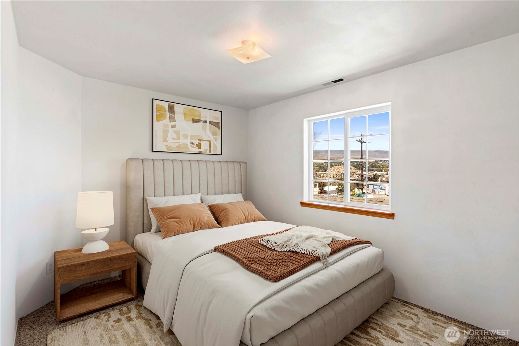 203 Marr Street Wenatchee, WA 98801 - Photo 19 of 22 a bedroom with bed and a window