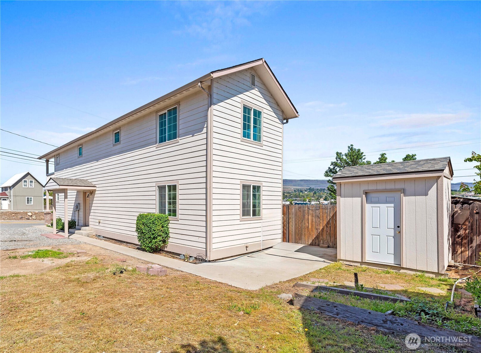 203 Marr Street Wenatchee, WA 98801 - Photo 22 of 22 a front view of a house with a yard