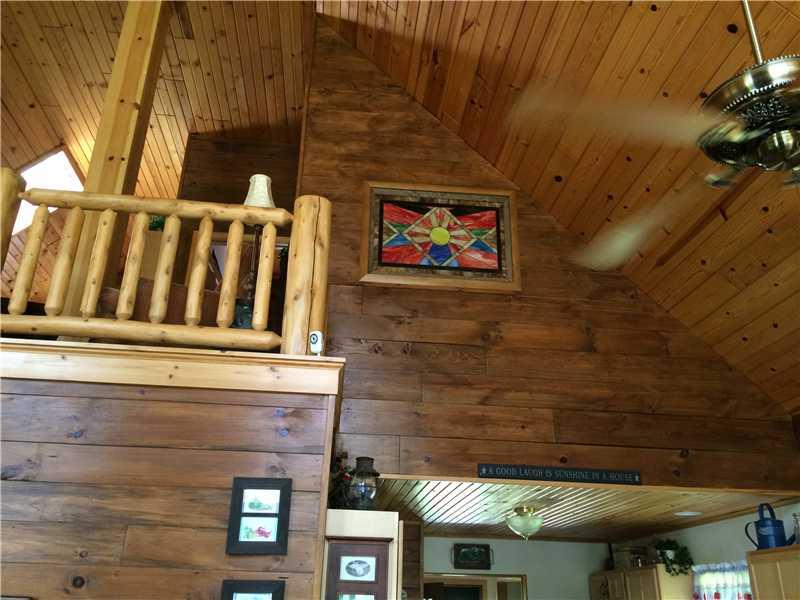 1406 Camp Coulter Road Knox, PA 16232 - Photo 17 of 25 Other. View of Loft and Stained Glass Window from first floor