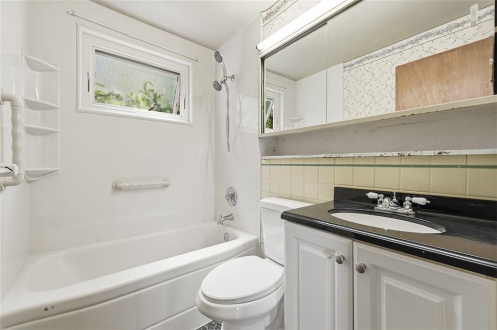 328 Ruthwood Avenue Pittsburgh, PA 15227 - Photo 12 of 32 a bathroom with a sink a toilet and bathtub