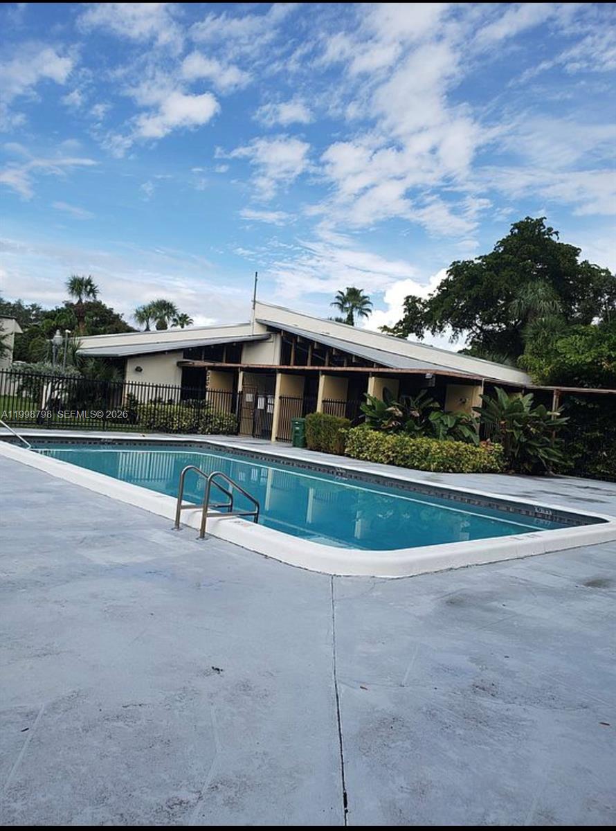 3301 Raleigh Street, Unit 4A Hollywood, FL 33021 - Photo 11 of 11 a view of house with outdoor space and street
