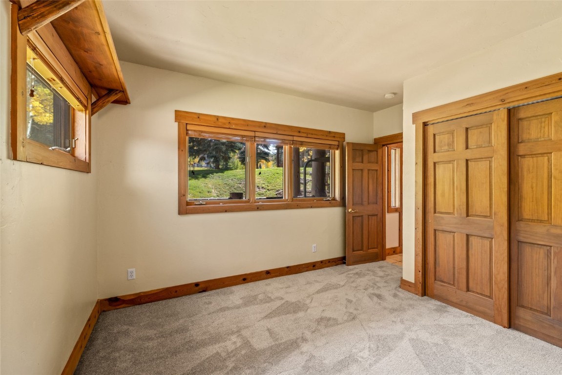 1775 Latigo Loop Steamboat Springs, CO 80487 - Photo 21 of 31 an empty room with windows