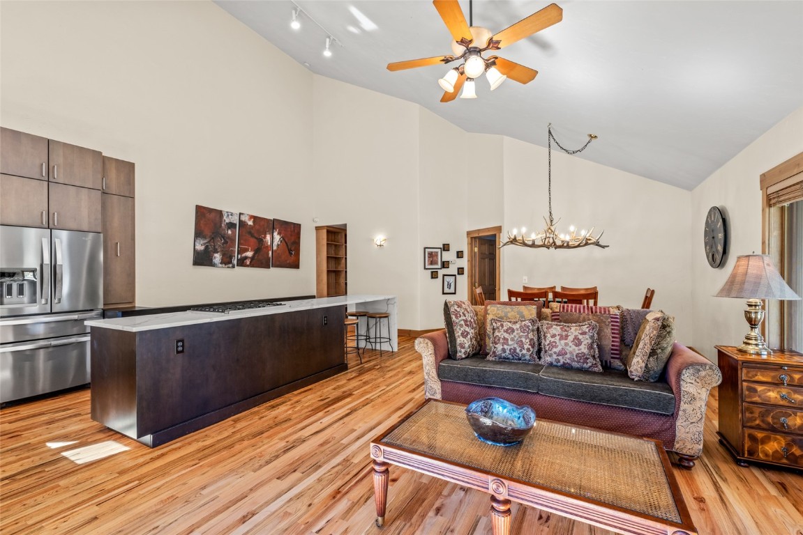 1775 Latigo Loop Steamboat Springs, CO 80487 - Photo 4 of 31 a living room with furniture and a wooden floor