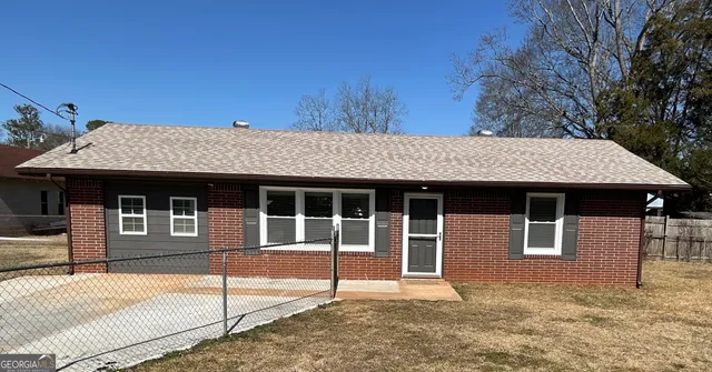 a bathroom with a sink vanity and a mirror