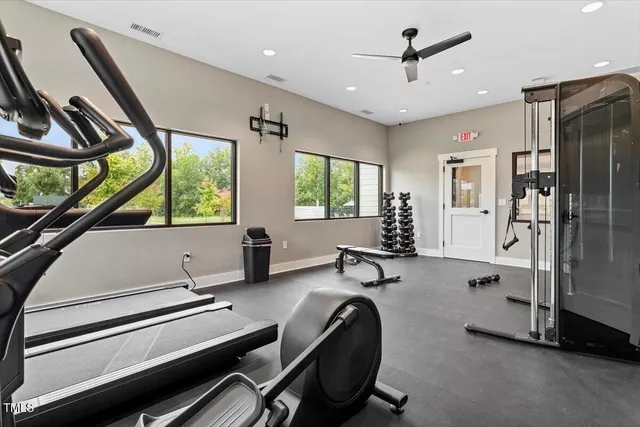 a bathroom with a sink toilet and a mirror