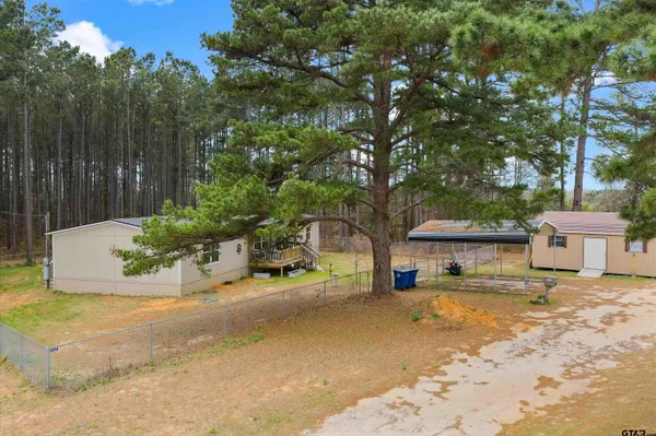 a view of a street with houses