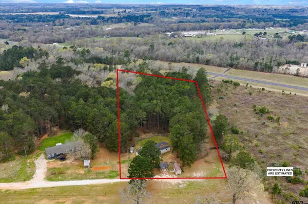 an aerial view of residential house with outdoor space