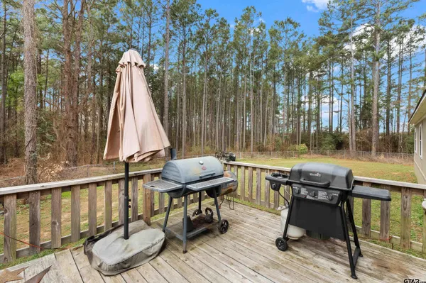 a view of swimming pool with chairs