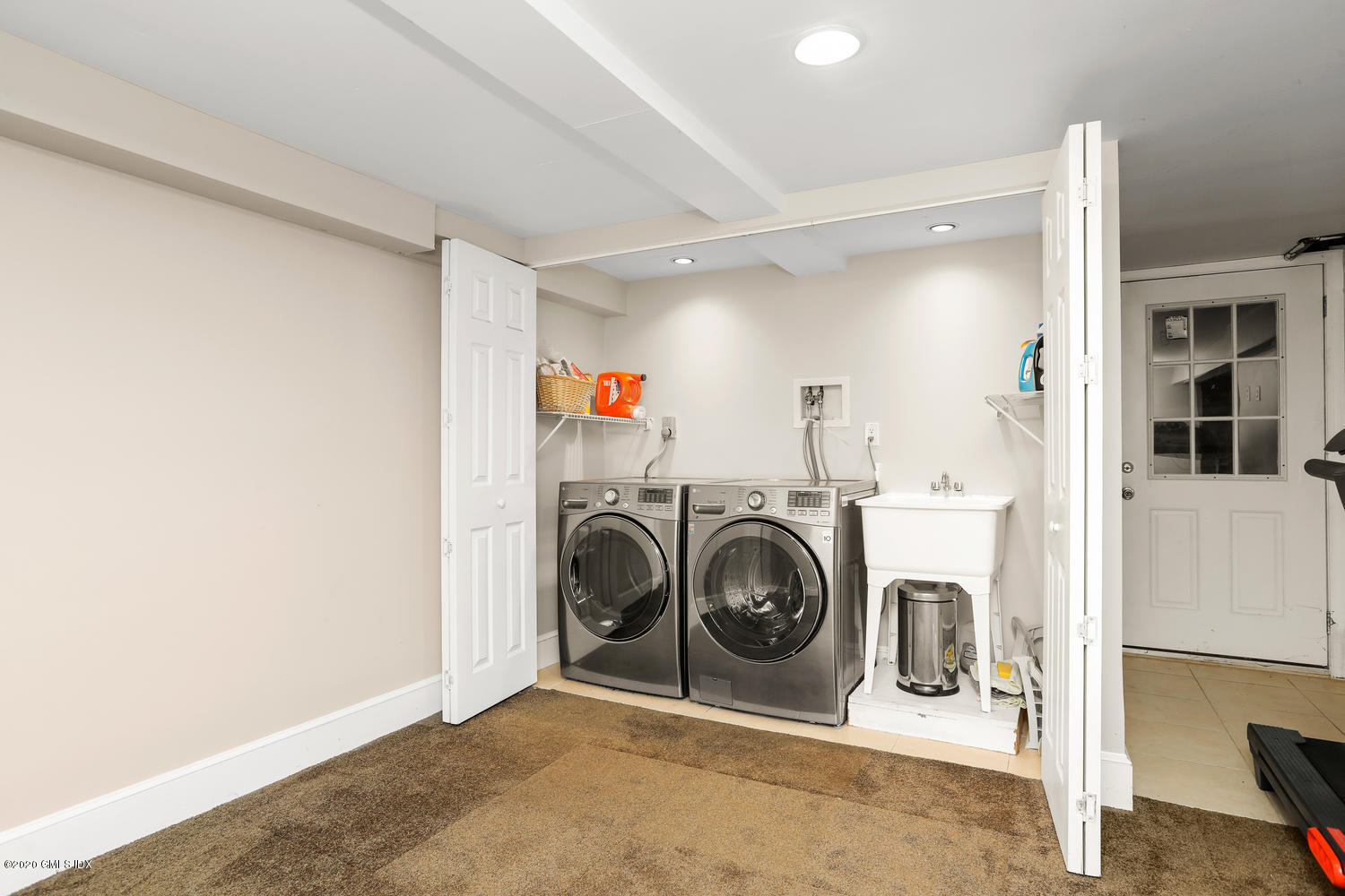 262 Eden Road Stamford, CT 06907 - Photo 21 of 38 a view of a storage & utility room with dryer and washer