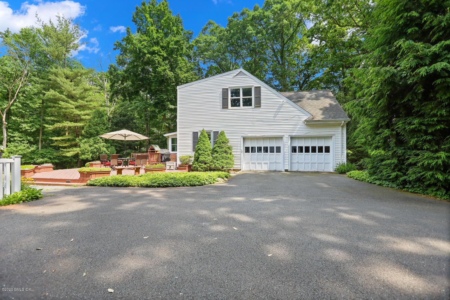 262 Eden Road Stamford, CT 06907 - Photo 31 of 38 a view of an house with backyard and garden
