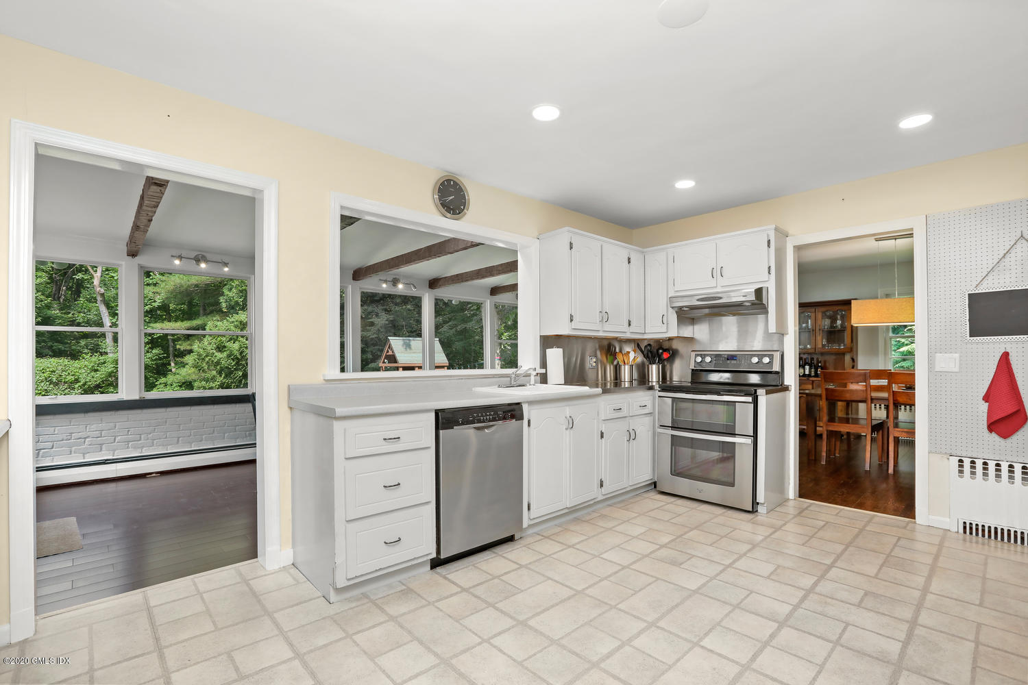 262 Eden Road Stamford, CT 06907 - Photo 7 of 38 a kitchen with granite countertop cabinets and stainless steel appliances