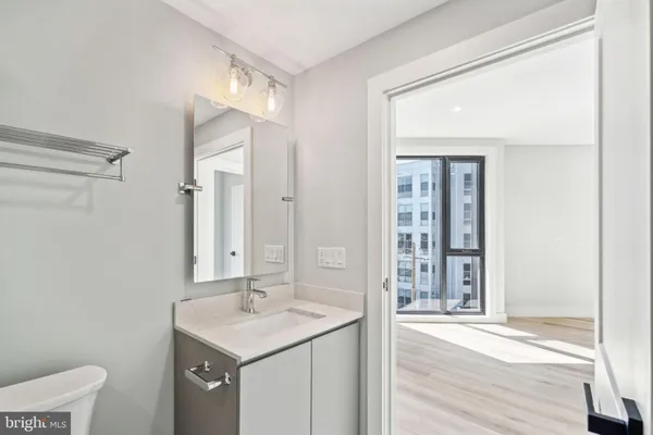 a bathroom with a shower and a toilet
