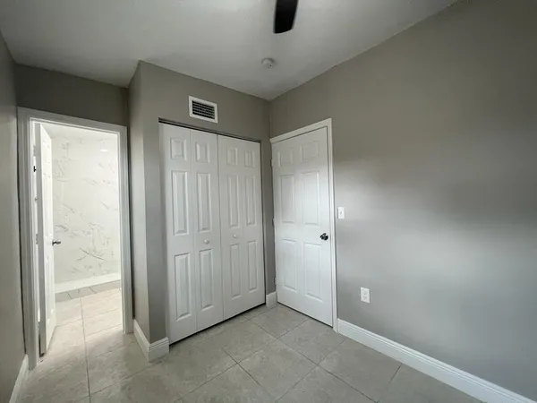 a kitchen with a stove and a microwave