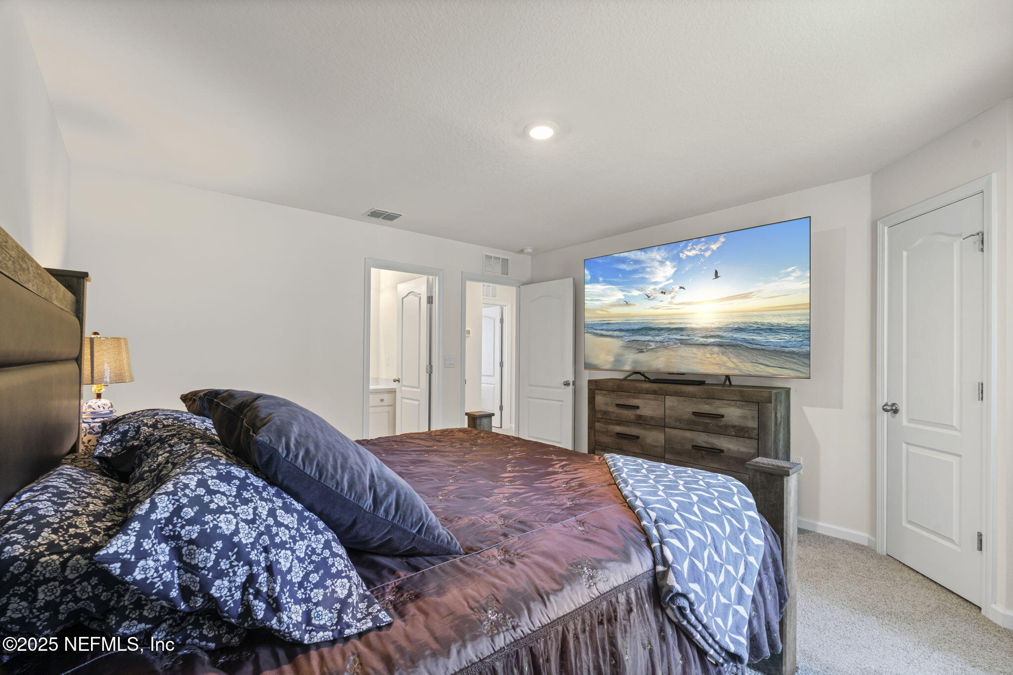 263 Talulla Trail St. Augustine, FL 32095 - Photo 15 of 32 a bedroom with a bed and a television