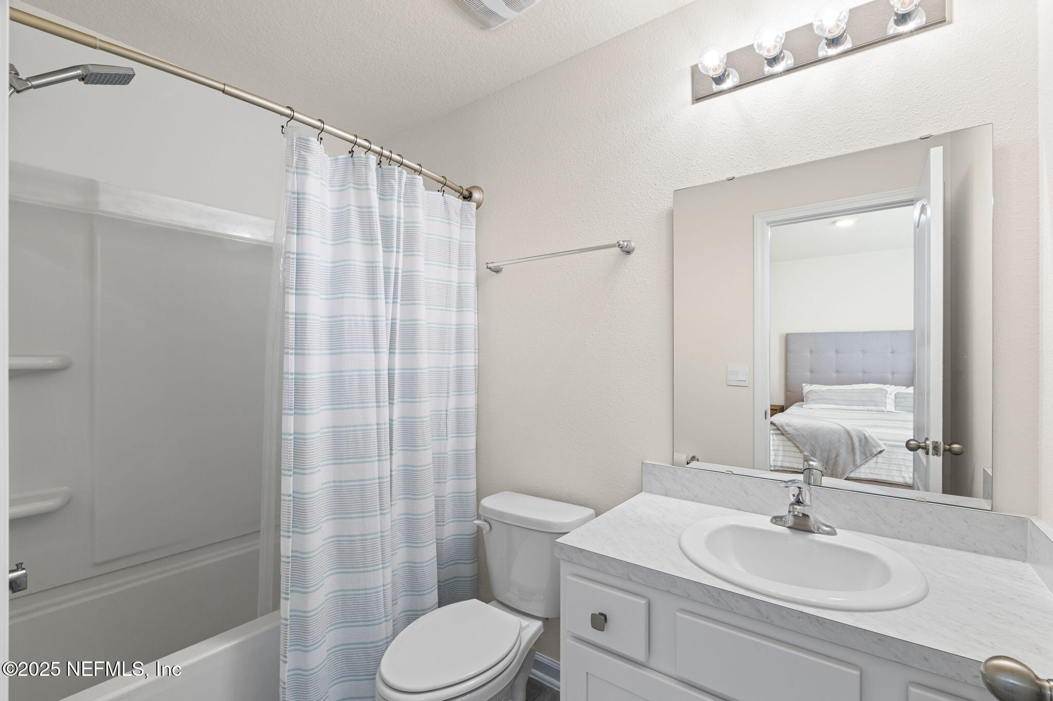 263 Talulla Trail St. Augustine, FL 32095 - Photo 20 of 32 a bathroom with a sink toilet and shower