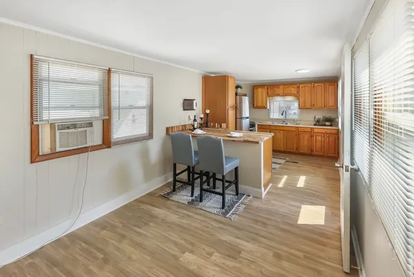 a bathroom with a toilet sink and shower
