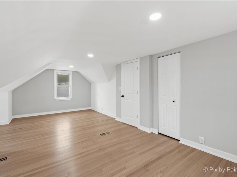 3922 West 59th Place Chicago, IL 60629 - Photo 13 of 29 a view of an empty room with wooden floor