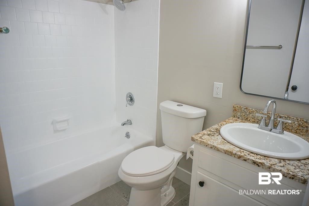 6205 Zeigler Boulevard Mobile, AL 36608 - Photo 10 of 17 Bathroom with vanity and shower / bath combination