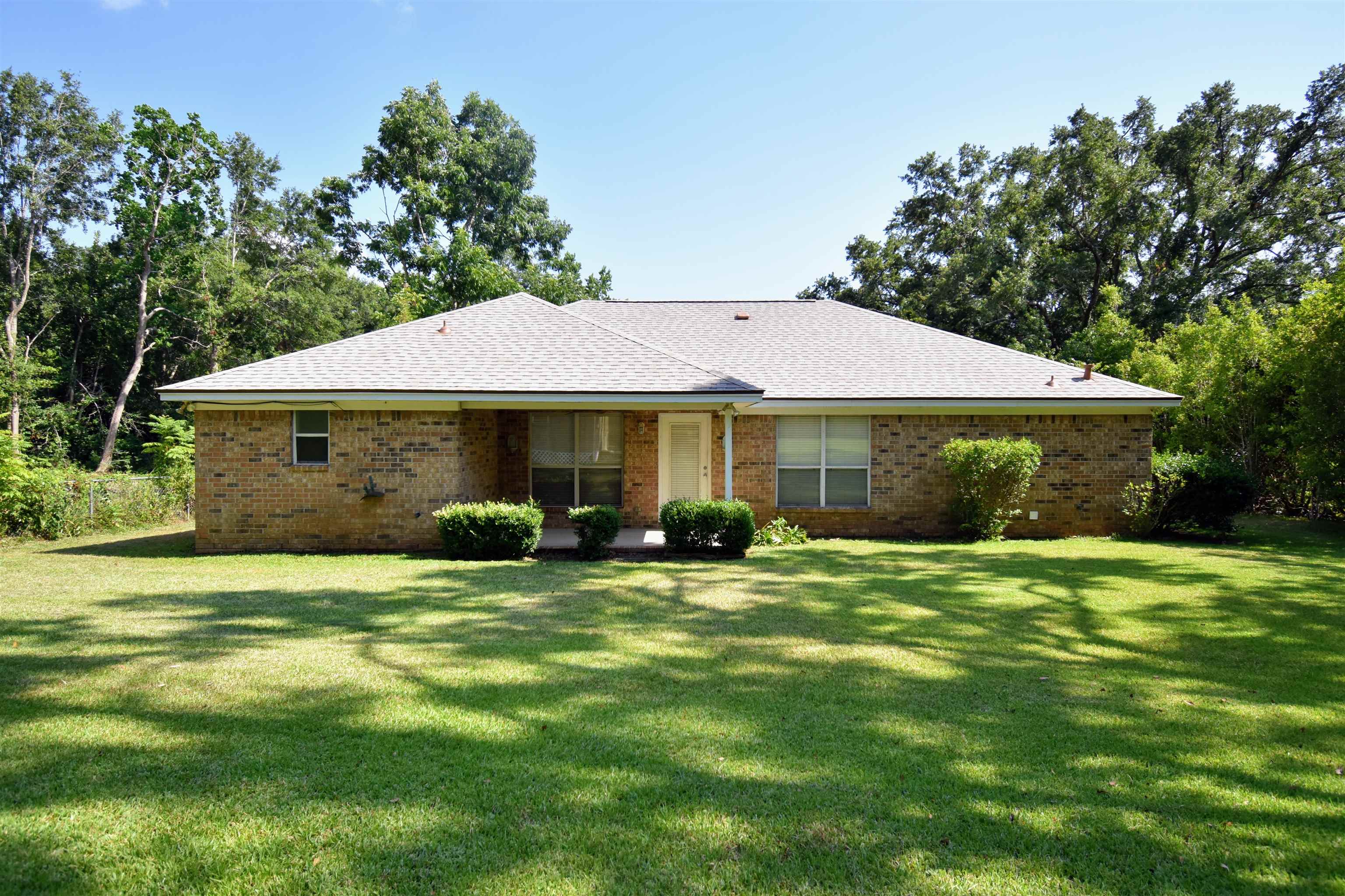 715 Johnson Avenue Fairhope, AL 36532 - Photo 13 of 14 Shady Backyard!!