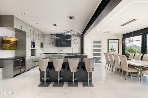 a view of a dining room with furniture window and outside view