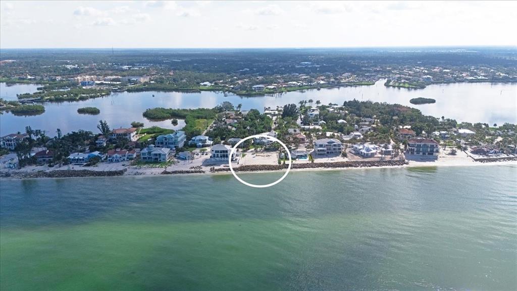 3761 Casey Key Road Nokomis, FL 34275 - Photo 14 of 23 an aerial view of a house with a lake view