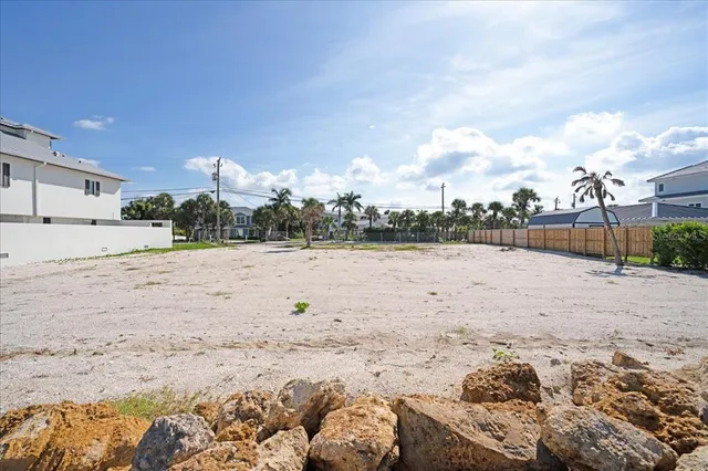 a view of a beach with a ocean view
