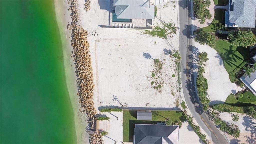 3761 Casey Key Road Nokomis, FL 34275 - Photo 19 of 23 an aerial view of a house with a yard
