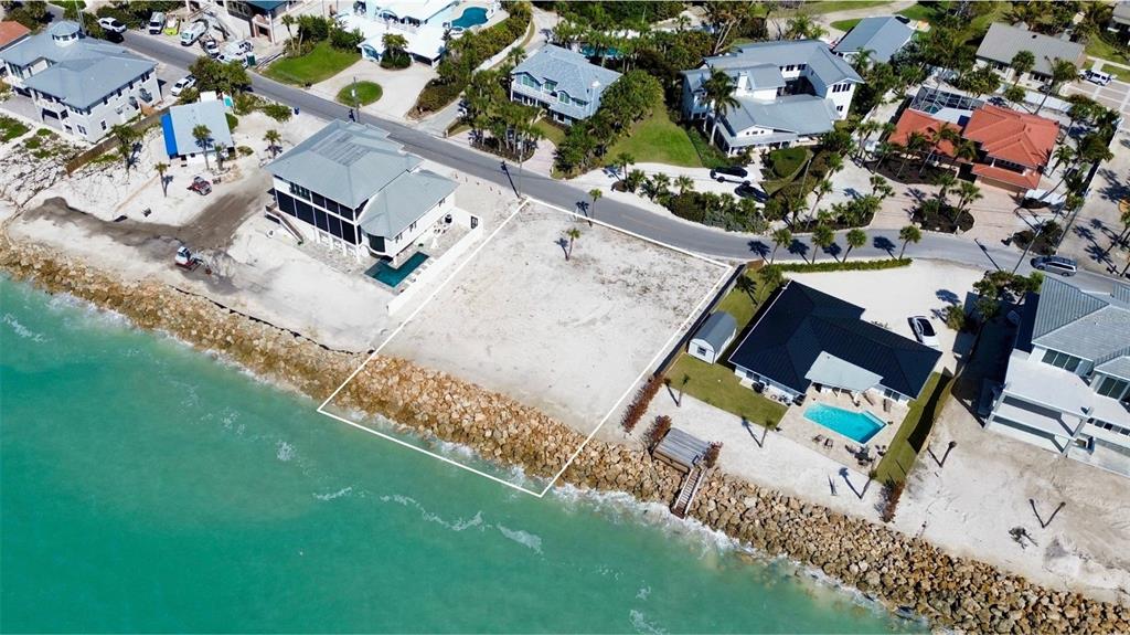 3761 Casey Key Road Nokomis, FL 34275 - Photo 20 of 23 an aerial view of residential house with outdoor space and parking