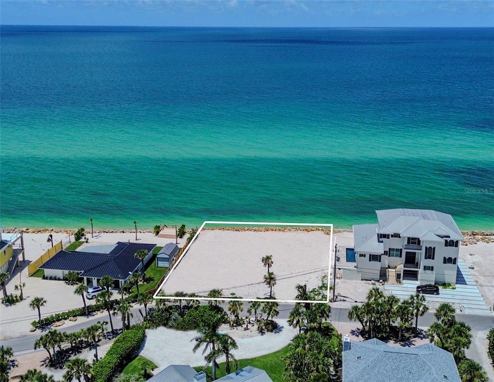 3761 Casey Key Road Nokomis, FL 34275 - Photo 23 of 23 an aerial view of a house with a garden