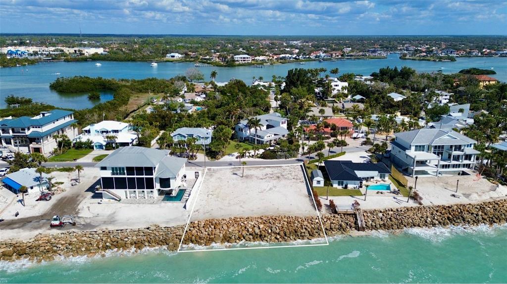 3761 Casey Key Road Nokomis, FL 34275 - Photo 7 of 23 an aerial view of a house with a garden and lake view