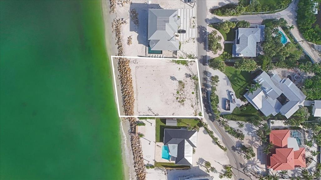 3761 Casey Key Road Nokomis, FL 34275 - Photo 9 of 23 an aerial view of residential houses with outdoor space