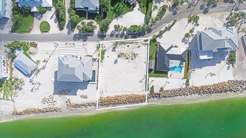 3761 Casey Key Road Nokomis, FL 34275 - Photo 10 of 23 an aerial view of a house with a yard