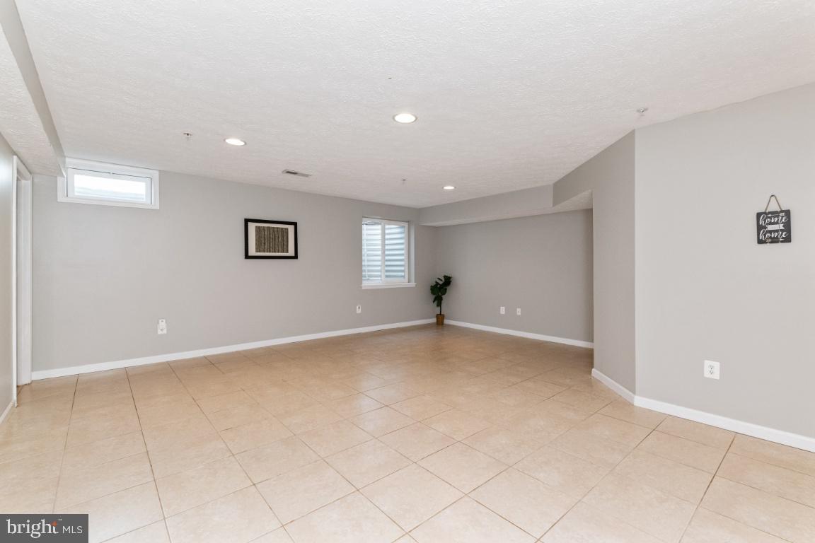 9817 Davison Road Baltimore, MD 21220 - Photo 29 of 43 Recreational room in lower level