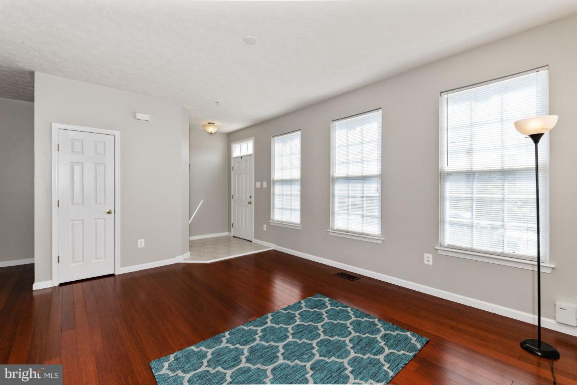 9817 Davison Road Baltimore, MD 21220 - Photo 4 of 43 Living Room with gleaming hardwood floors