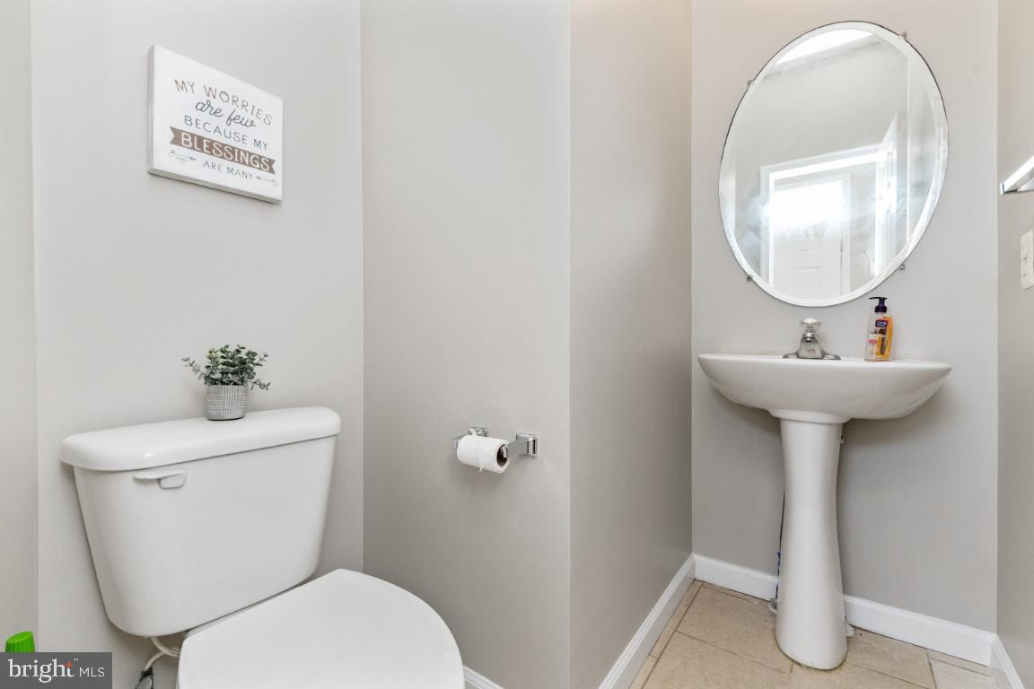 9817 Davison Road Baltimore, MD 21220 - Photo 6 of 43 Half bathroom on main level