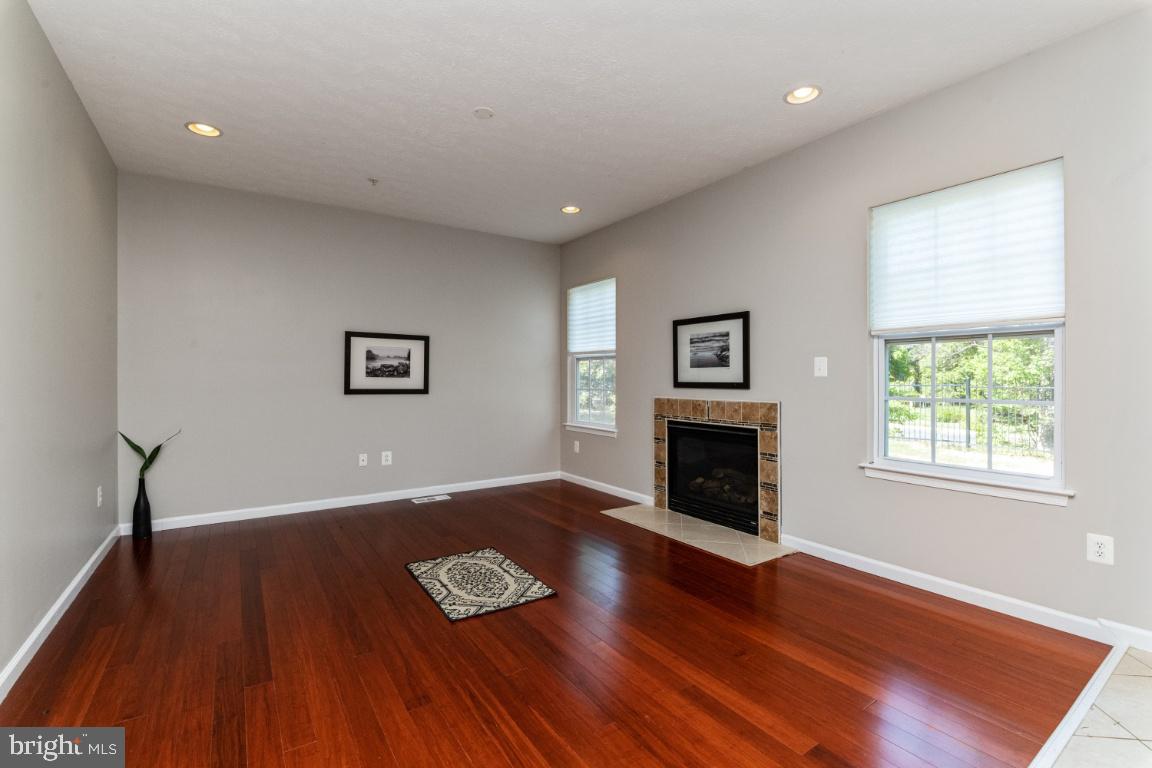 9817 Davison Road Baltimore, MD 21220 - Photo 9 of 43 Welcoming family room with fireplace