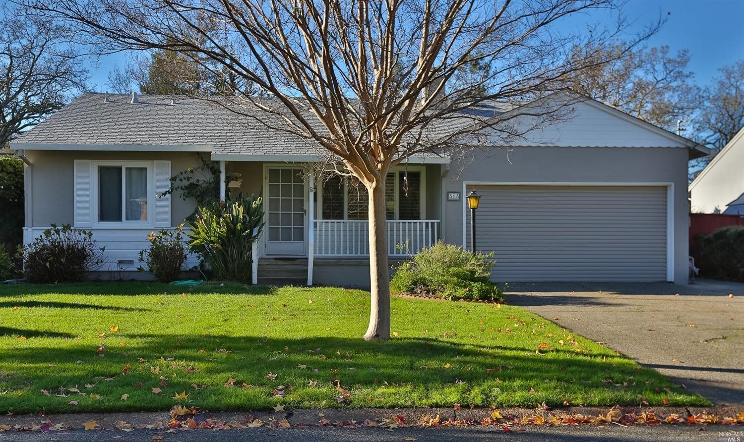 a view of a house with a garden