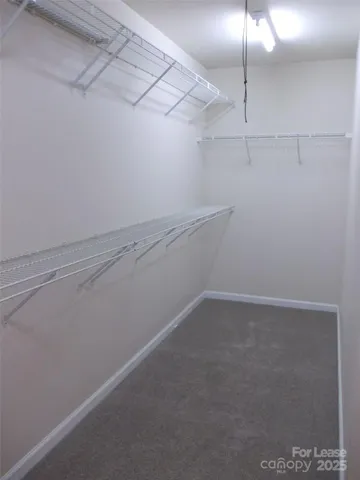 a view of a room with racks on the wall