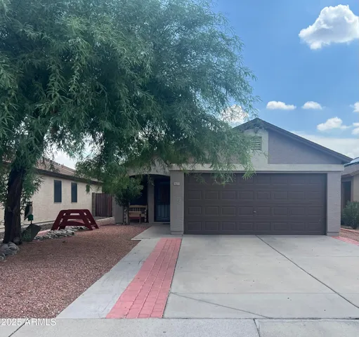 a car parked in front of garage