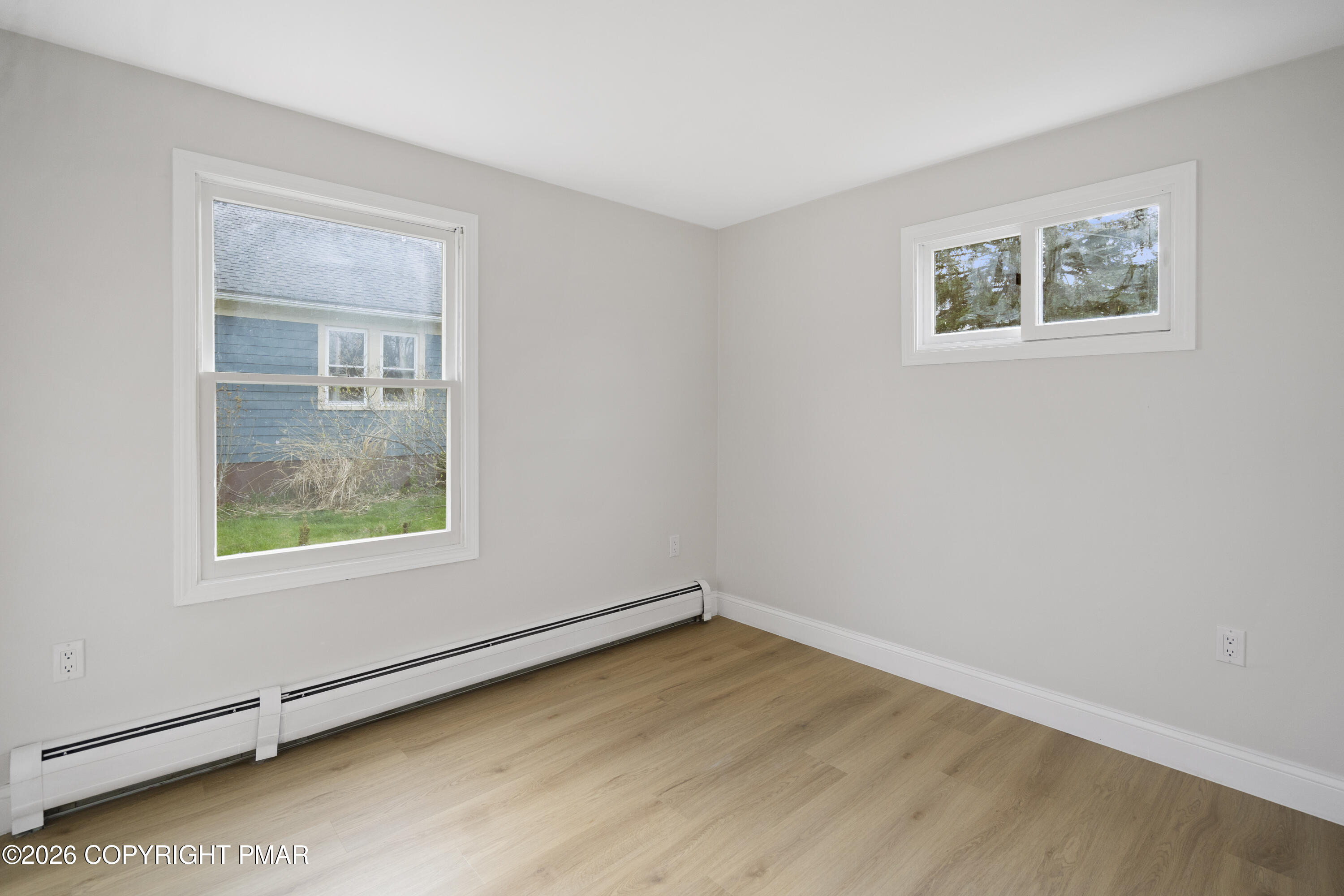 605 5th Street Matamoras, PA 18336 - Photo 18 of 27 an empty room with a window