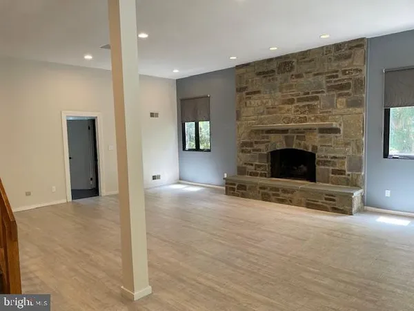 a view of a livingroom with a fireplace