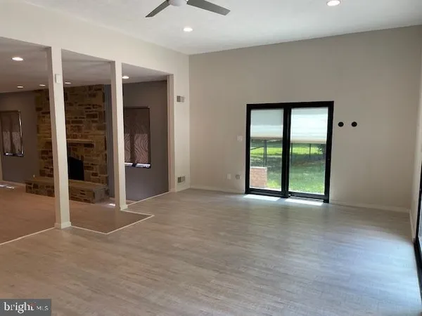 a view of an empty room and window