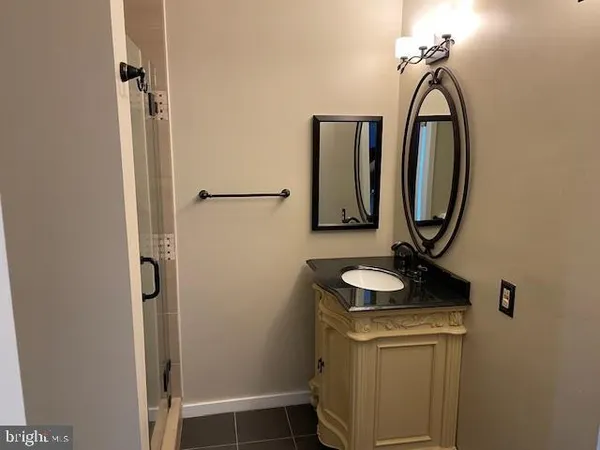 a view of an empty room with windows