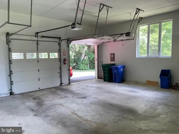 a view of green field with trees