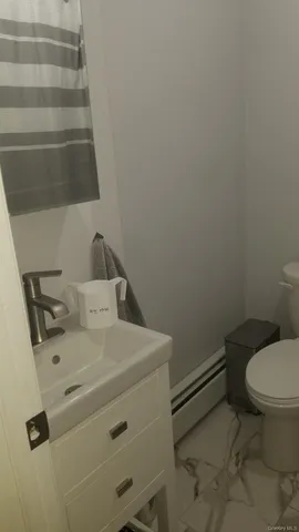 a view of deck with furniture and trees around