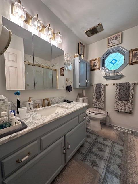 102 Keswick Farm Road Troutville, VA 24175 - Photo 19 of 29 a bathroom with a granite countertop toilet sink and mirror