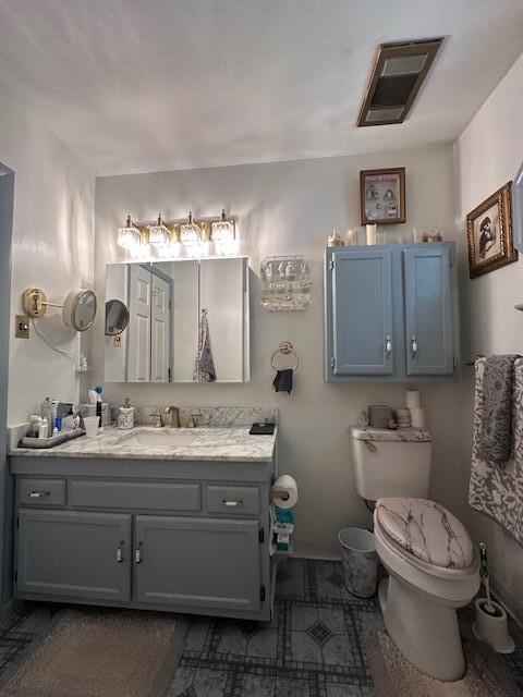 102 Keswick Farm Road Troutville, VA 24175 - Photo 20 of 29 a bathroom with a granite countertop toilet sink and mirror