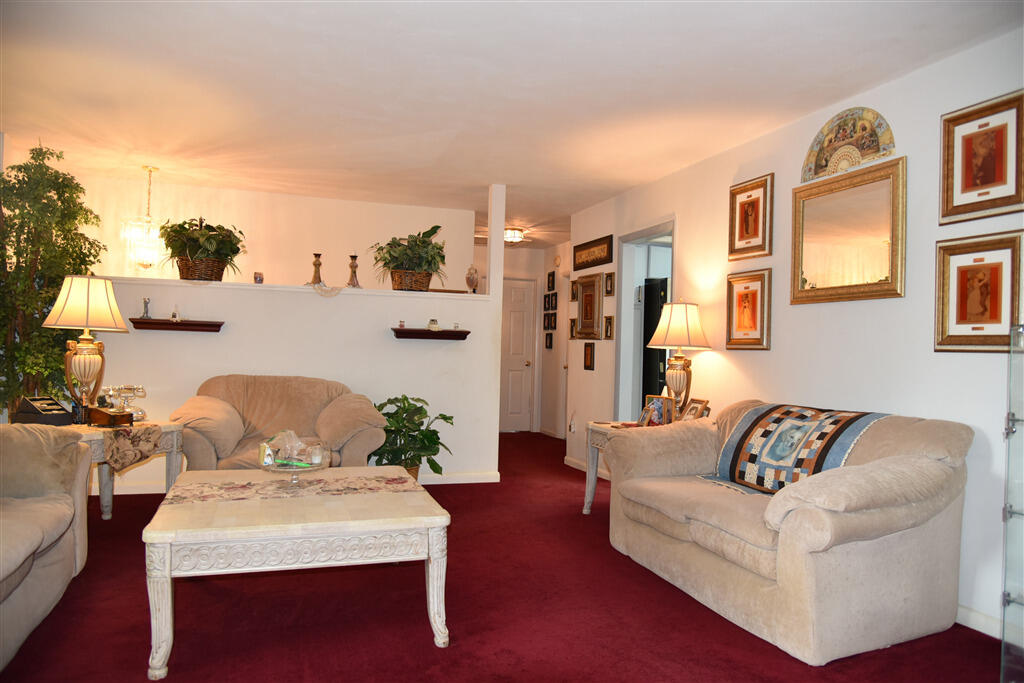 102 Keswick Farm Road Troutville, VA 24175 - Photo 8 of 29 a living room with furniture and painting on the wall